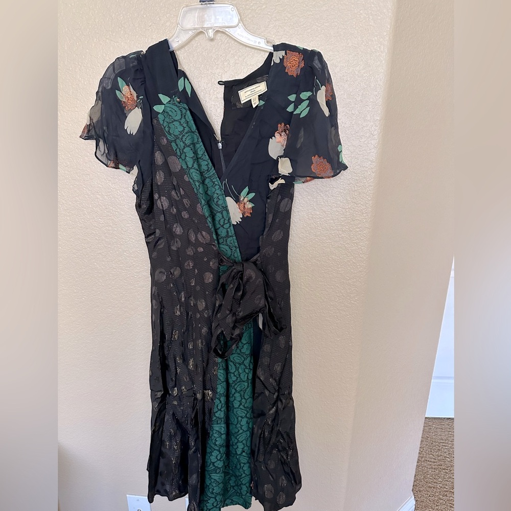 Midi black dress with dark green lace panel, sparkle and floral